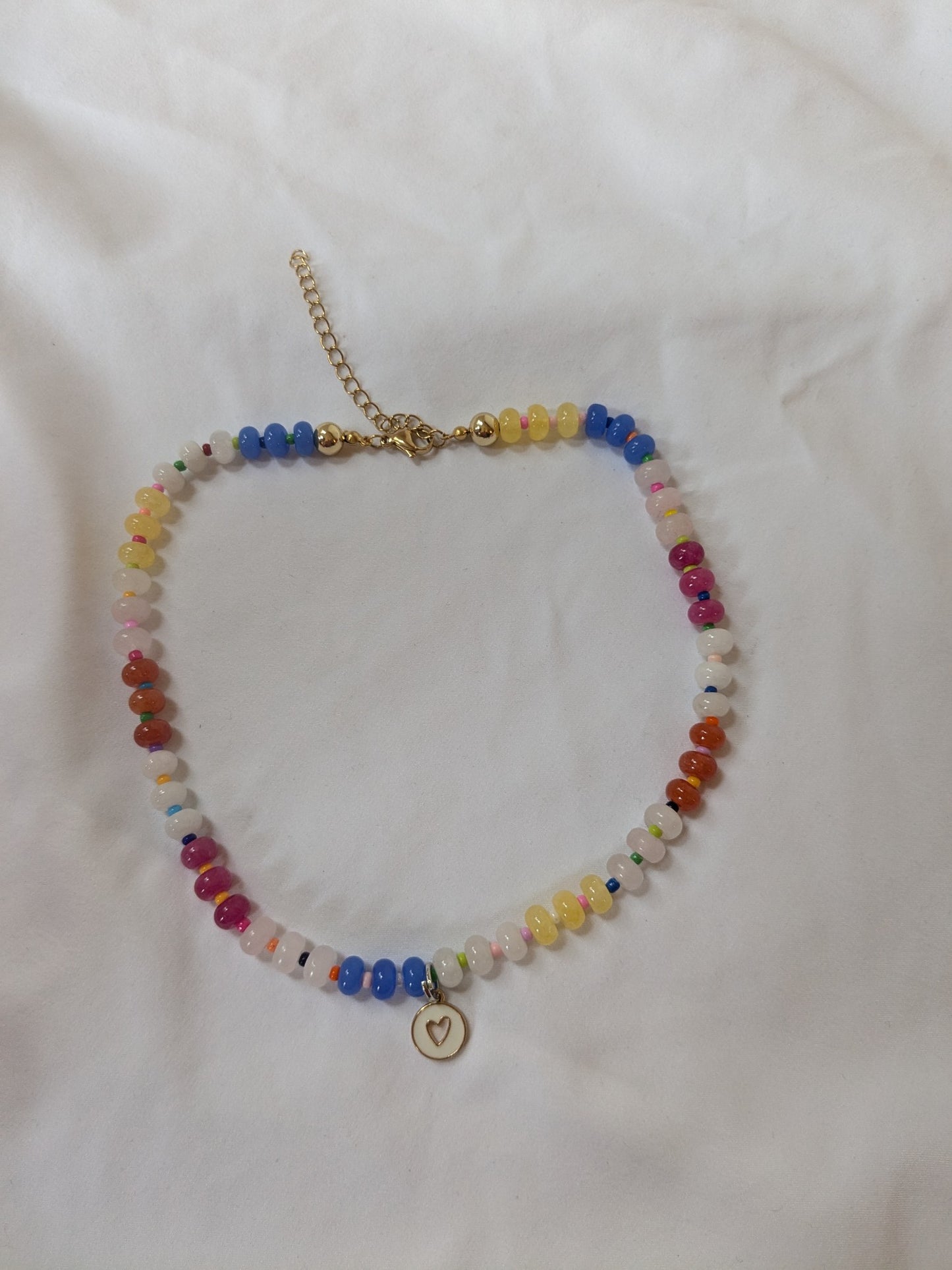 Vibrant Multicolor Gemstone Necklace with White Heart Charm! 🌟